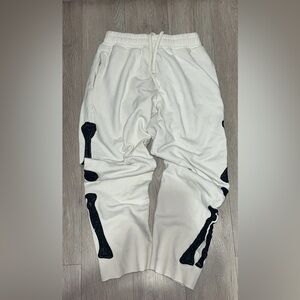 MNML Skeleton Sweat Pants in off-white/cream with black chain stitch embroidery